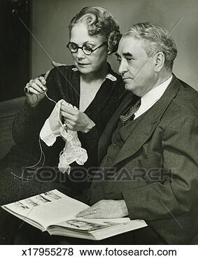 Stock Photo - senior couple 
spending time 
together in living 
room, (b&w). fotosearch 
- search stock 
photos, pictures, 
images, and photo 
clipart