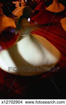 Stock Photo - whirling dervishes 
at the mevlevi 
monastery. fotosearch 
- search stock 
photos, pictures, 
images, and photo 
clipart