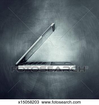 Stock Photo - close-up side 
view of laptop. 
fotosearch - search 
stock photos, 
pictures, images, 
and photo clipart