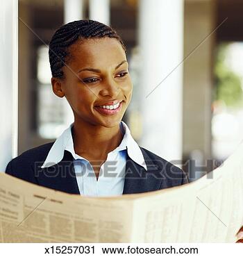 Stock Photography - businesswoman 
reading a newspaper. 
fotosearch - search 
stock photos, 
pictures, images, 
and photo clipart