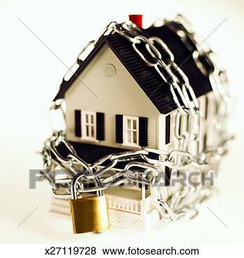 Stock Photo - house chained 
and padlocked. 
fotosearch - search 
stock photos, 
pictures, images, 
and photo clipart