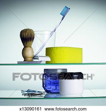 Stock Photography - close-up of a 
glass cabinet 
containing toiletries. 
fotosearch - search 
stock photos, 
pictures, images, 
and photo clipart