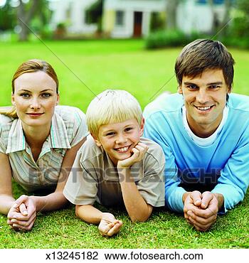 Stock Photo - family relaxing 
in the garden. 
fotosearch - search 
stock photos, 
pictures, images, 
and photo clipart