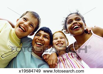 Stock Photograph - close-up front 
view of four friends 
smiling with arms 
around each. fotosearch 
- search stock 
photos, pictures, 
images, and photo 
clipart