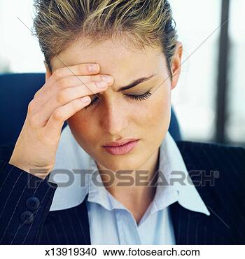 Stock Photography - front view of 
businesswoman 
touching her head 
with pain. fotosearch 
- search stock 
photos, pictures, 
images, and photo 
clipart