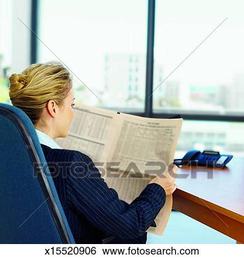 Stock Photo - side view of businesswoman 
reading newspaper. 
fotosearch - search 
stock photos, 
pictures, images, 
and photo clipart