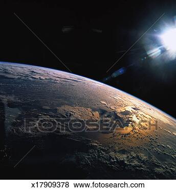 Stock Photo - view from space 
of the suns rays 
falling on earth. 
fotosearch - search 
stock photos, 
pictures, images, 
and photo clipart