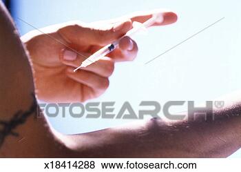 Stock Photo - man injecting 
drugs in tattooed 
arm. fotosearch 
- search stock 
photos, pictures, 
images, and photo 
clipart