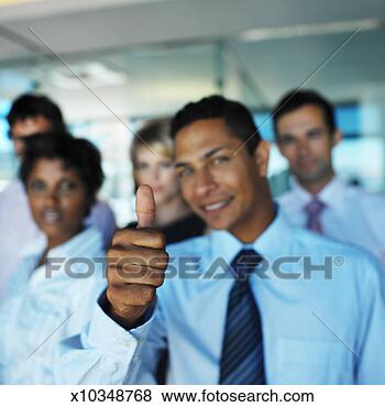 Stock Photo - a young business 
man giving the 
ok hand signal 
with a group of. 
fotosearch - search 
stock photos, 
pictures, images, 
and photo clipart