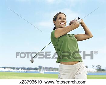 Banque de Photographies - gros plan, jeune, 
femme, oscillation, 
golf, club. fotosearch 
- recherchez des 
photos, des images 
et des cliparts