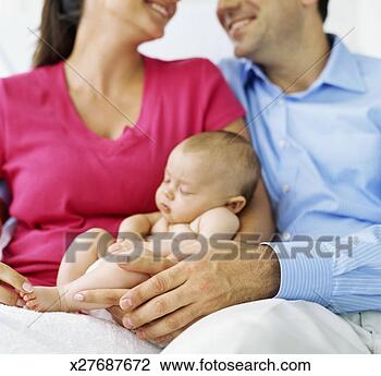 Stock Photo - mid section view 
of a mid adult 
couple with their 
son. fotosearch 
- search stock 
photos, pictures, 
images, and photo 
clipart