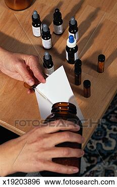 Stock Photo - homeopathic medicine 
preparation. fotosearch 
- search stock 
photos, pictures, 
images, and photo 
clipart