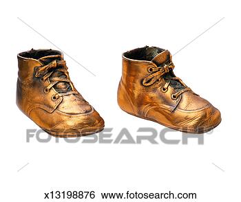 Stock Photo - bronze baby shoes. fotosearch - search stock photos