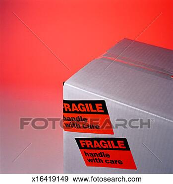 Stock Photograph - box marked with 
'fragile - handle 
with care'. fotosearch 
- search stock 
photos, pictures, 
images, and photo 
clipart