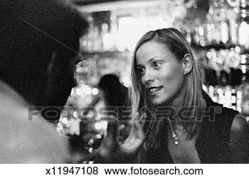 Stock Photo - couple at bar, 
talking. fotosearch 
- search stock 
photos, pictures, 
images, and photo 
clipart