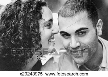 Stock Image - smiling young 
couple. fotosearch 
- search stock 
photos, pictures, 
images, and photo 
clipart