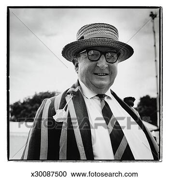 Stock Photography - elderly man wearing 
a straw hat. fotosearch 
- search stock 
photos, pictures, 
images, and photo 
clipart