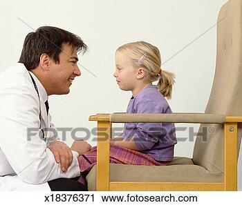 Stock Photography - male doctor face 
to face with girl 
(4-6) on chair, 
side view. fotosearch 
- search stock 
photos, pictures, 
images, and photo 
clipart