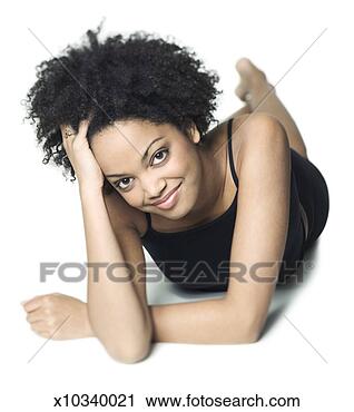 Stock Photography - full body shot 
of a young african 
american woman 
in a black workout. 
fotosearch - search 
stock photos, 
pictures, images, 
and photo clipart