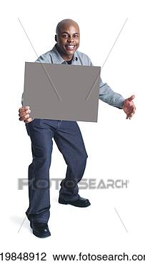 Stock Photo - a young bald african 
american man wearing 
dark slacks and 
a grey. fotosearch 
- search stock 
photos, pictures, 
images, and photo 
clipart