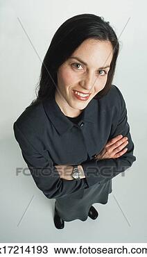 Stock Photo - a beauiful young 
caucasian woman 
with long dark 
hair in a dark 
grey. fotosearch 
- search stock 
photos, pictures, 
images, and photo 
clipart