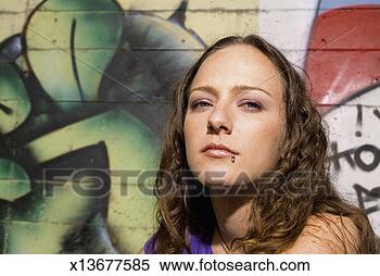 Stock Image - woman with piercings, 
close-up. fotosearch 
- search stock 
photos, pictures, 
images, and photo 
clipart