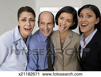 Stock Photography - portrait of four 
businesspeople 
making faces, 
close-up. fotosearch 
- search stock 
photos, pictures, 
images, and photo 
clipart