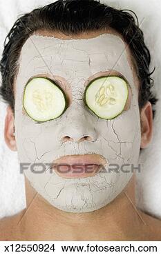 Stock Photo - man with beauty 
mask on face, 
extreme close-up. 
fotosearch - search 
stock photos, 
pictures, images, 
and photo clipart