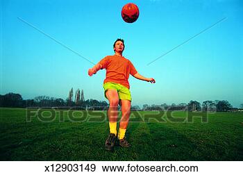 Stock Photograph - balance, ball 
game, caucasian, 
daylight. fotosearch 
- search stock 
photos, pictures, 
images, and photo 
clipart
