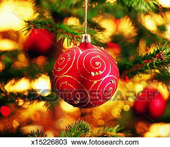 Stock Photo - christmas hanging 
from a christmas 
tree. fotosearch 
- search stock 
photos, pictures, 
images, and photo 
clipart