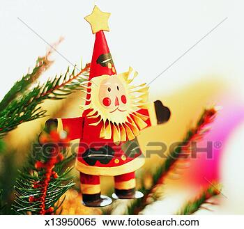 Stock Image - father christmas 
decoration hanging 
from a christmas 
tree. fotosearch 
- search stock 
photos, pictures, 
images, and photo 
clipart
