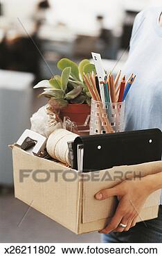Stock Photo - mid section view 
of a businesswoman 
holding a cardboard 
box. fotosearch 
- search stock 
photos, pictures, 
images, and photo 
clipart