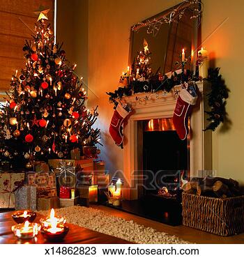 Stock Photo - christmas tree, 
 presents,  christmas 
decorations and 
an open fire in. 
fotosearch - search 
stock photos, 
pictures, images, 
and photo clipart