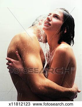 Stock Photo - couple with their 
arms around each 
other standing 
nude in the shower. 
fotosearch - search 
stock photos, 
pictures, images, 
and photo clipart