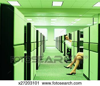 Stock Photography - businessman staring 
at businesswoman's 
legs from his 
desk. fotosearch 
- search stock 
photos, pictures, 
images, and photo 
clipart