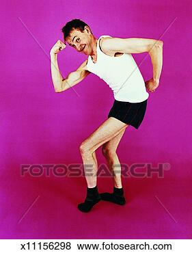 Stock Photo - portrait of a 
half dressed, 
thin geeky man. 
fotosearch - search 
stock photos, 
pictures, images, 
and photo clipart