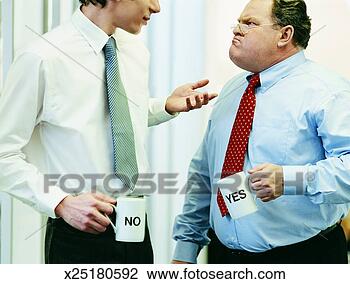 Stock Photo - two businessmen 
arguing with both 
of them holding 
mugs labelled 
'yes'. fotosearch 
- search stock 
photos, pictures, 
images, and photo 
clipart