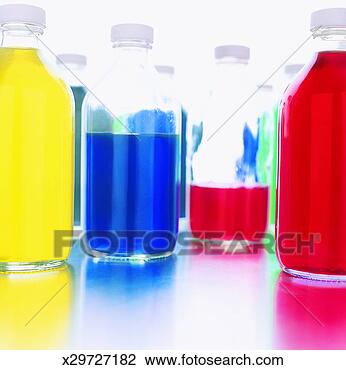 Stock Photo - glass bottles 
filled with brightly 
coloured liquids. 
fotosearch - search 
stock photos, 
pictures, images, 
and photo clipart