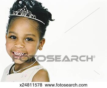 Stock Photo - studio portrait 
of a young girl 
wearing a tiara 
and dressed as 
a. fotosearch 
- search stock 
photos, pictures, 
images, and photo 
clipart