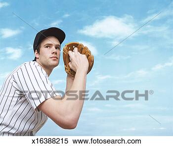 Stock Image - baseball pitcher 
preparing to pitch 
a baseball. fotosearch 
- search stock 
photos, pictures, 
images, and photo 
clipart