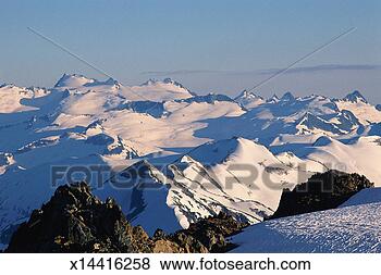 Stock Photo - snow-capped coastal 
mountain range. 
fotosearch - search 
stock photos, 
pictures, images, 
and photo clipart