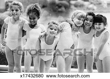 Stock Photography - ballet students 
posing and smiling. 
fotosearch - search 
stock photos, 
pictures, images, 
and photo clipart