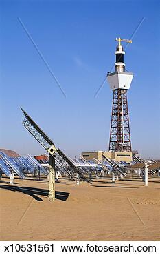 Stock Photography - solar panels at 
solar energy plant 
with pylon and 
building in. fotosearch 
- search stock 
photos, pictures, 
images, and photo 
clipart