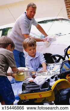 Stock Photo - man washing car; 
two boys washing 
toy car. fotosearch 
- search stock 
photos, pictures, 
images, and photo 
clipart