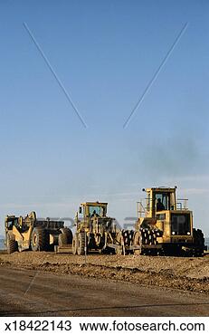 Stock Photo - row of heavy vehicle. 
fotosearch - search 
stock photos, 
pictures, images, 
and photo clipart