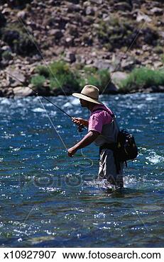 Picture - fly fisherman 
fly fishing. fotosearch 
- search stock 
photos, pictures, 
images, and photo 
clipart