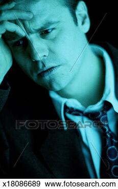 Stock Photograph - businessman with 
a stressed facial 
expression. fotosearch 
- search stock 
photos, pictures, 
images, and photo 
clipart