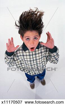 Picture - pre-teen male 
with shocked expression. 
fotosearch - search 
stock photos, 
pictures, images, 
and photo clipart