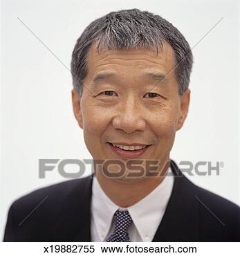 Stock Image - mature man with 
short grey hair 
posing in studio, 
portrait. fotosearch 
- search stock 
photos, pictures, 
images, and photo 
clipart