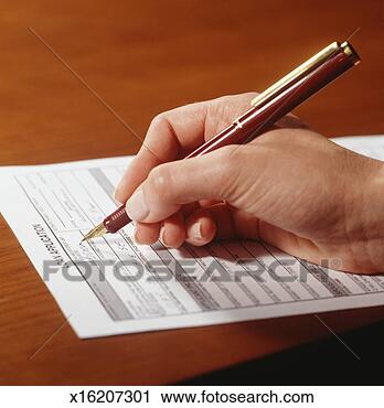 Stock Photography - man filling in 
application form, 
close-up of hand. 
fotosearch - search 
stock photos, 
pictures, images, 
and photo clipart
